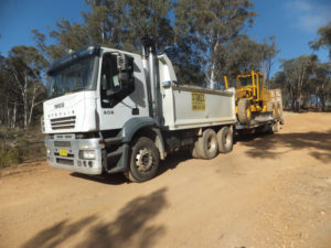 Grader loaded for transport - Wet Hire Sutton NSW